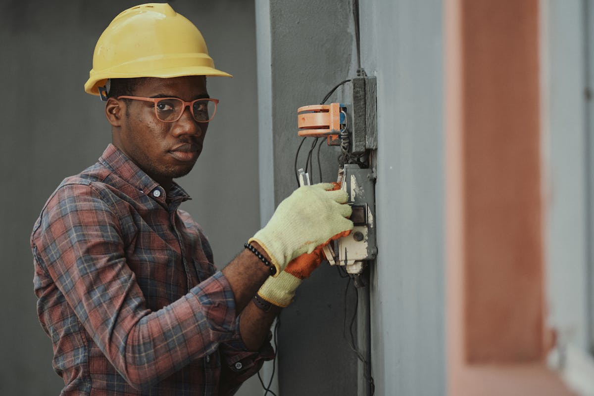 Friendly tradesman checking his phone — happy with his Google rankings
